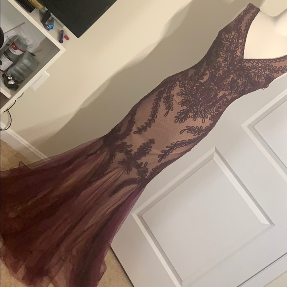 Deep maroon/plum gown